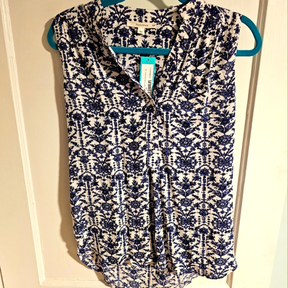 Blue & white, sleeveless, v-neck blouse.